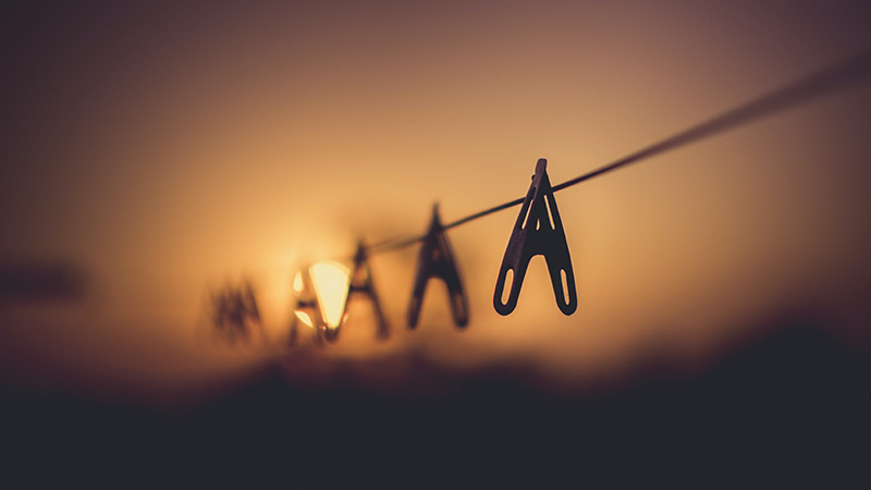 Cloth pegs and moon.